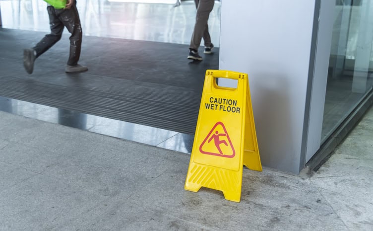Caution wet floor sign on wet floor