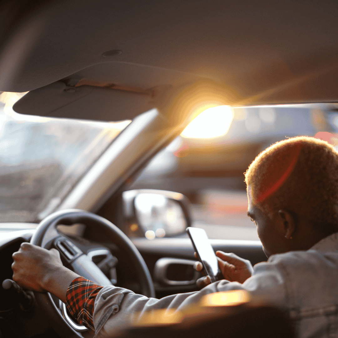 Lyft driver on his phone